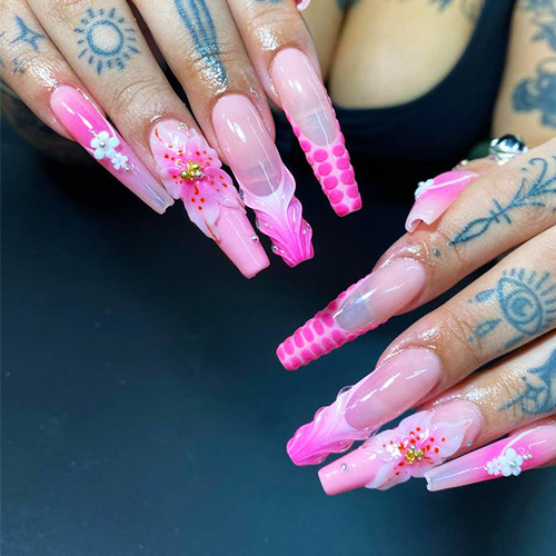 Extra long pink nail extensions