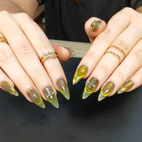Yellow glitter nail art