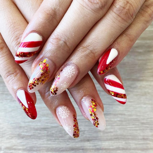 Christmas nails manicure with glitter and stripes