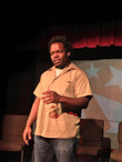 Darryl Charles on stage comic.jpeg