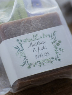 Wrapped soap Matthew & Jada 9/13/25 favor with floral design at wedding
