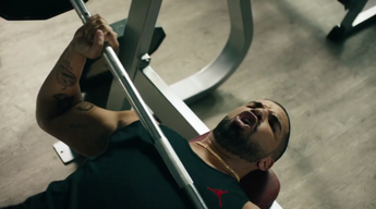 Watch Drake Lip Sync Taylor Swift’s “Bad Blood” While Bench Pressing In New Apple Music Ad