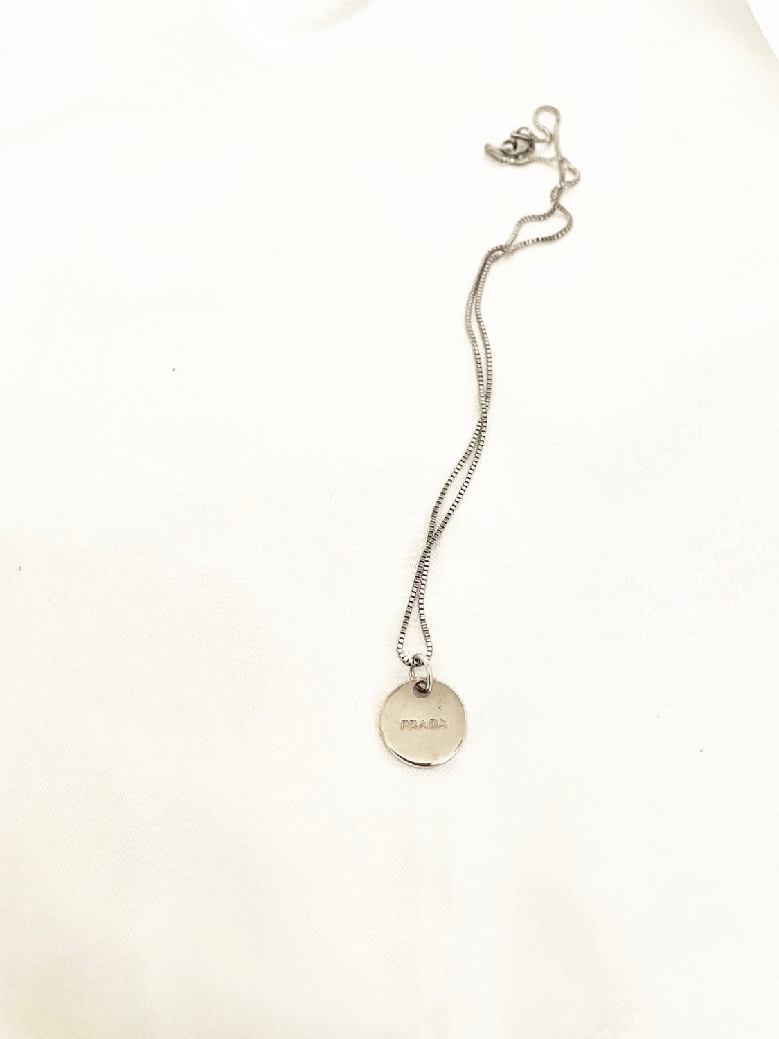 Repurposed Vintage Prada silver charm necklace