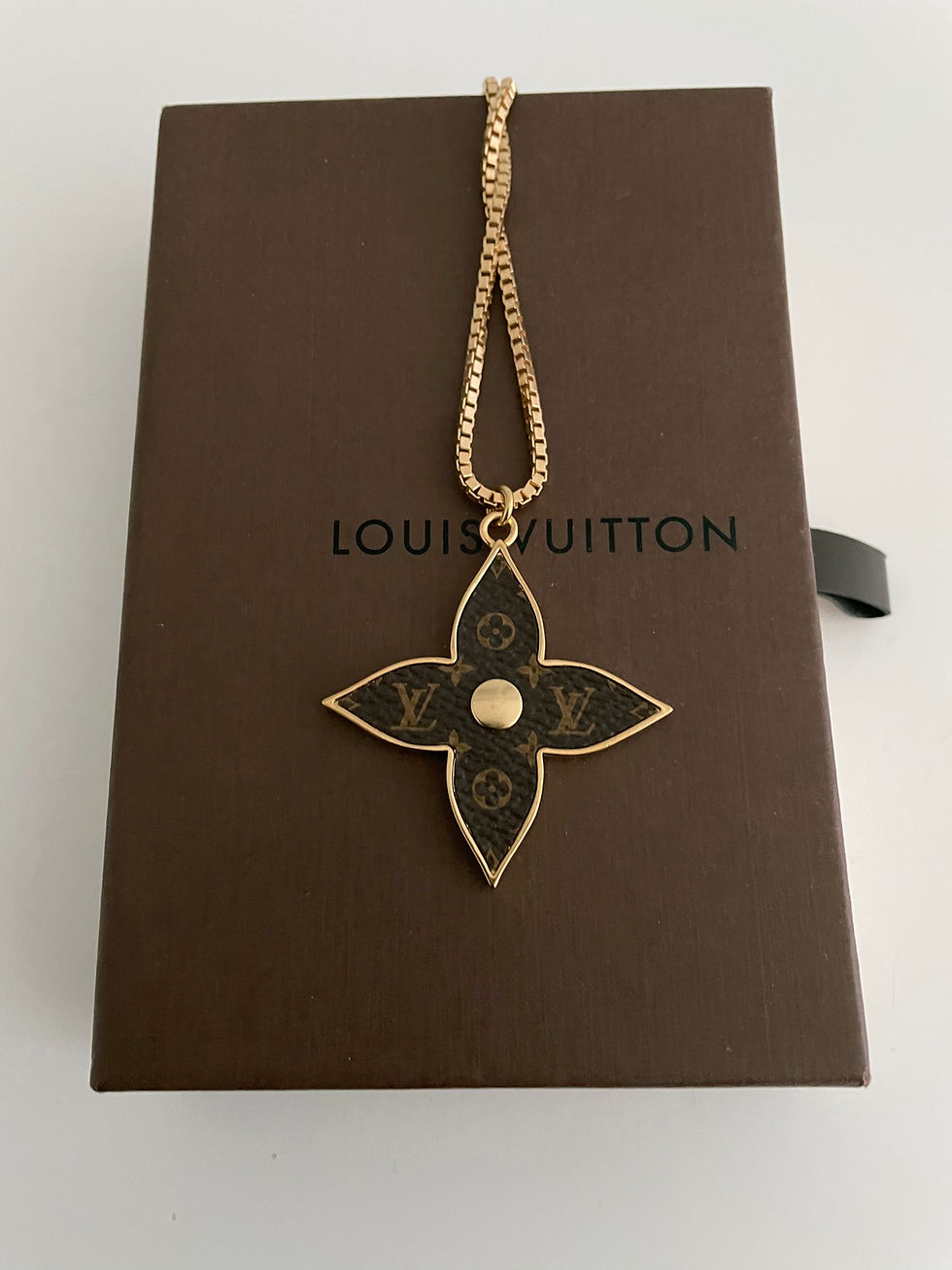 Thumbnail: Reworked Louis Vuitton iconic canvas fleur charm necklace