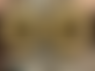 Two identical black, circular handmade art pieces by Ecstatic Art displayed on small wooden easels. Both feature a gold and white dot mandala art design with the central gold Ik Onkar symbol, making them perfect spiritual wall art for home decor art.