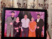 A framed, rectangular custom hand portrait by Ecstatic Art of a family of five standing together, with a purple-hued background. The framed custom digital illustration is a beautiful personalized art gift and home decor art piece, perfect as art for families.