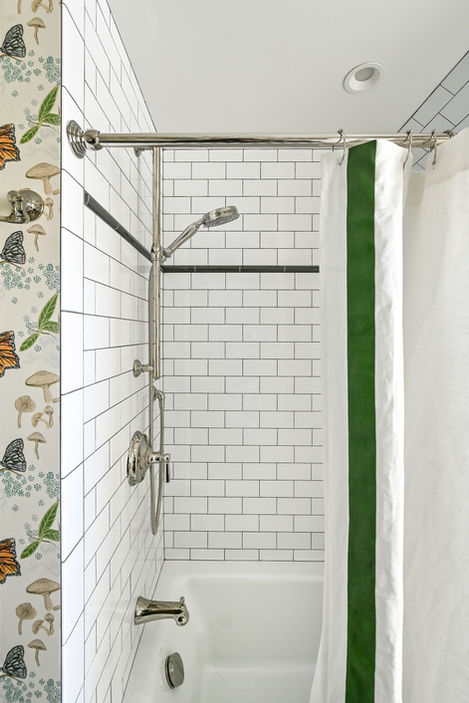 white subway tile with gray grout in shower
