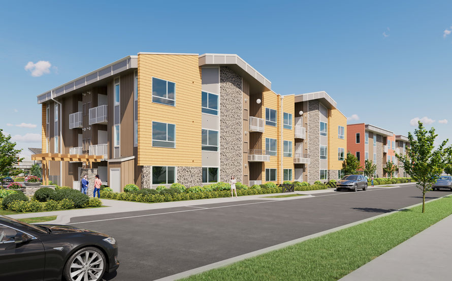 APARTMENT BUILDING WITH YELLOW LAP SIDDING AND STONE