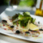 Octopus Carpaccio with salad & lemon oil