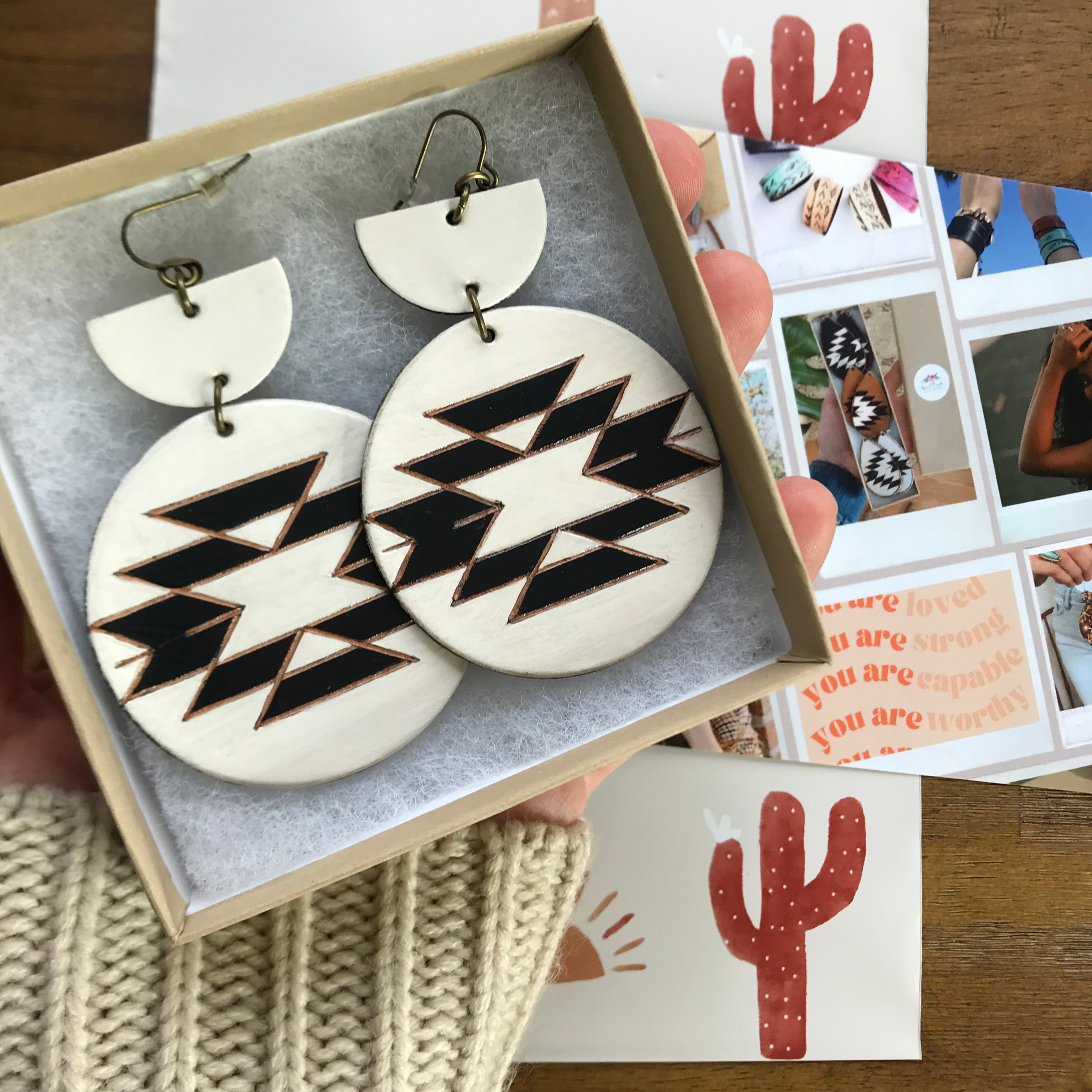 Southwestern style leather earrings in white and black