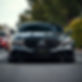 Front of Matte black blacked out Mercedes-Benz E63s facing the left in Melbourne australia