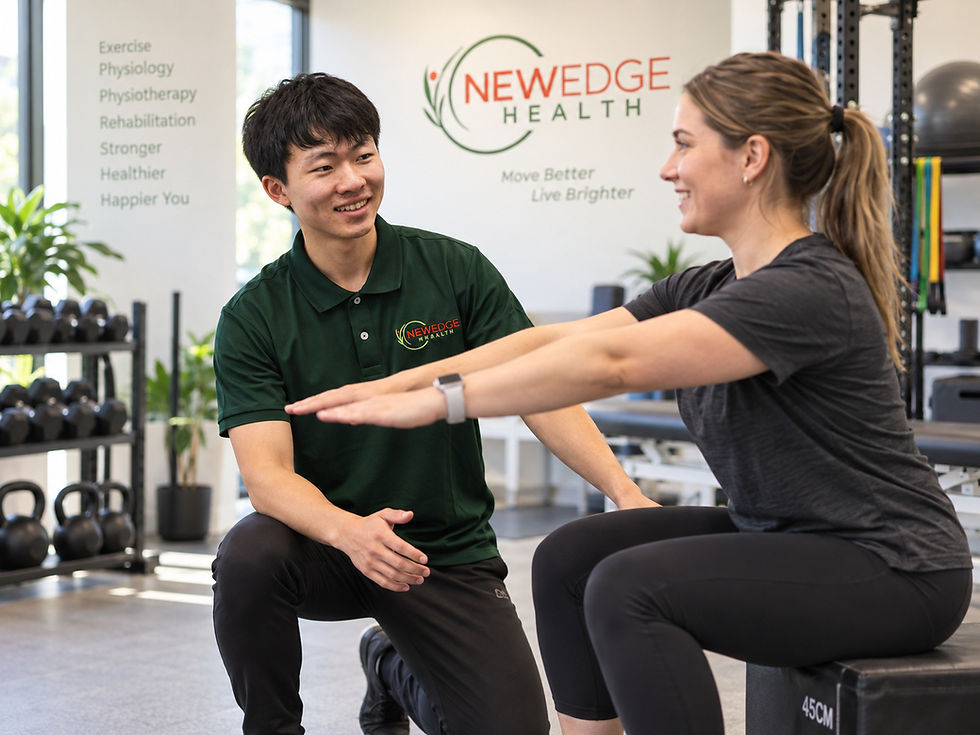 Trainer assisting woman with weight loss squats at Newedge Health.