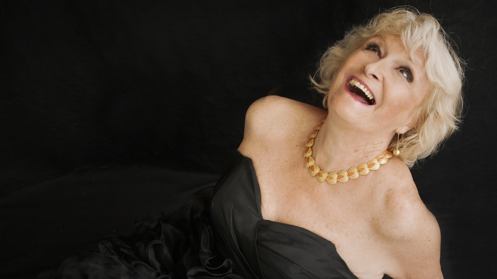 Beautiful 74 year old woman, mother and grandmother having a special day to be photographed. Legacy portraits