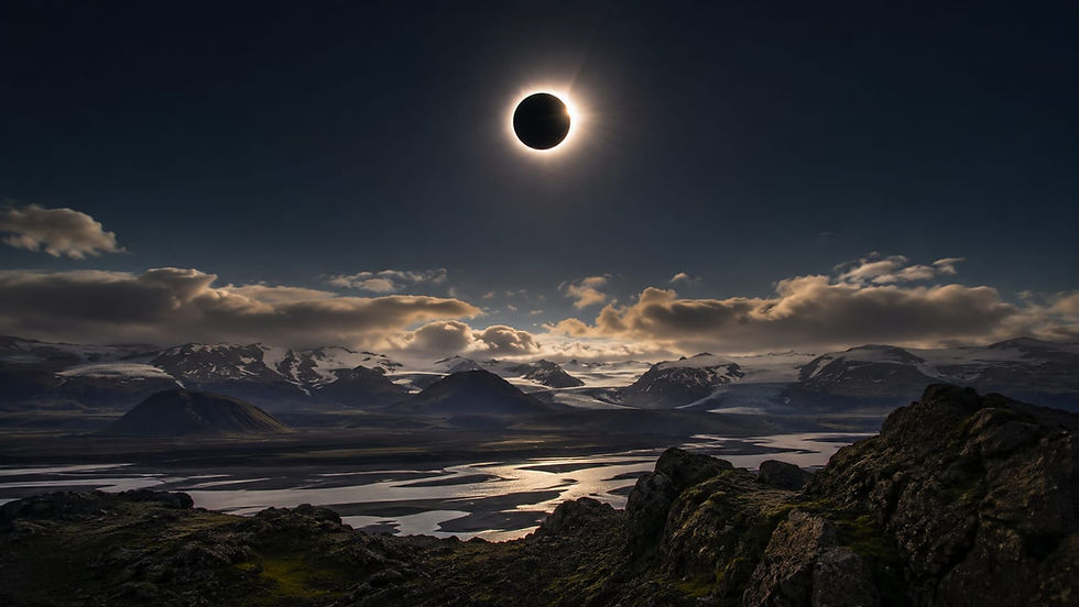 Solar eclipse above a dramatic landscape of snow-capped mountains and a winding river