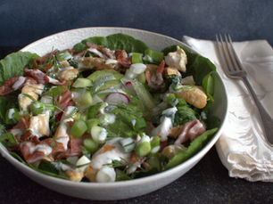 Warm chicken and bacon salad with avocado, tomatoes, cucumber and creamy ranch dressing.