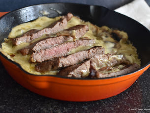Steak topped with a creamy mushroom and tarragon béarnaise sauce