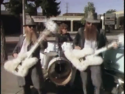 zz-top-guitar-spin-1373310472.gif