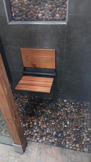 Luxury bathroom remodel with custom walk-in shower and tile flooring in Eagleville PA