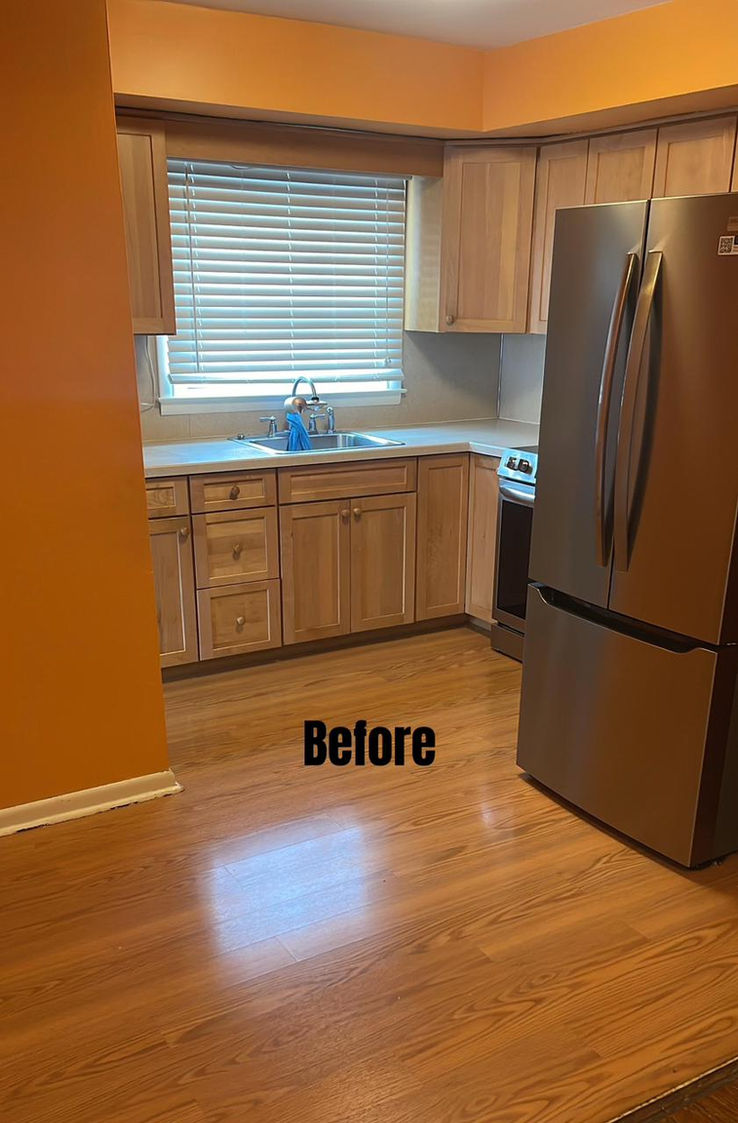Before kitchen remodel with original wood cabinets and flooring in Main Line, Pennsylvania