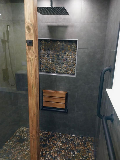 Luxury bathroom remodel with custom walk-in shower and tile flooring in Eagleville PA