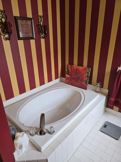 Old Built -in bathtub before bathroom remodeling in collegeville pa