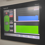 Schneider Electric HMI displaying production statistics.