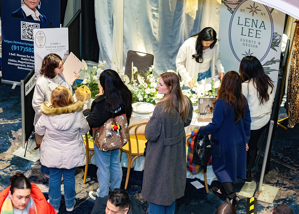 Group of engaged brides at a wedding expo stand.