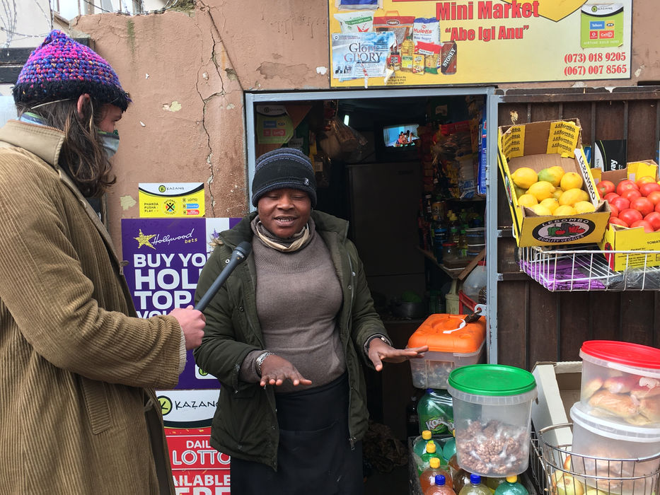 TV interview with a street vendor in Yeoville, Johannesburg.