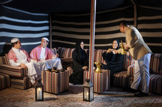 Family enjoying traditional Arabian hospitality