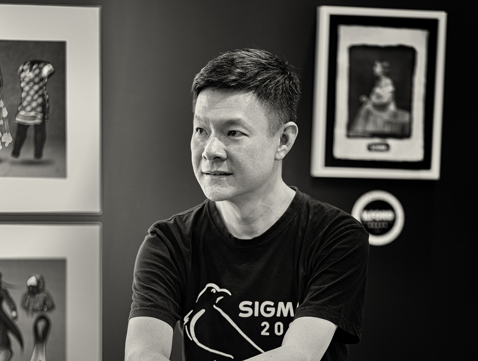 Headshot: Man in black SIGMA 2023 t-shirt