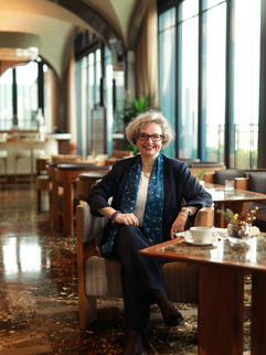 Woman in elegant lounge, The Pavilions Bali renovations