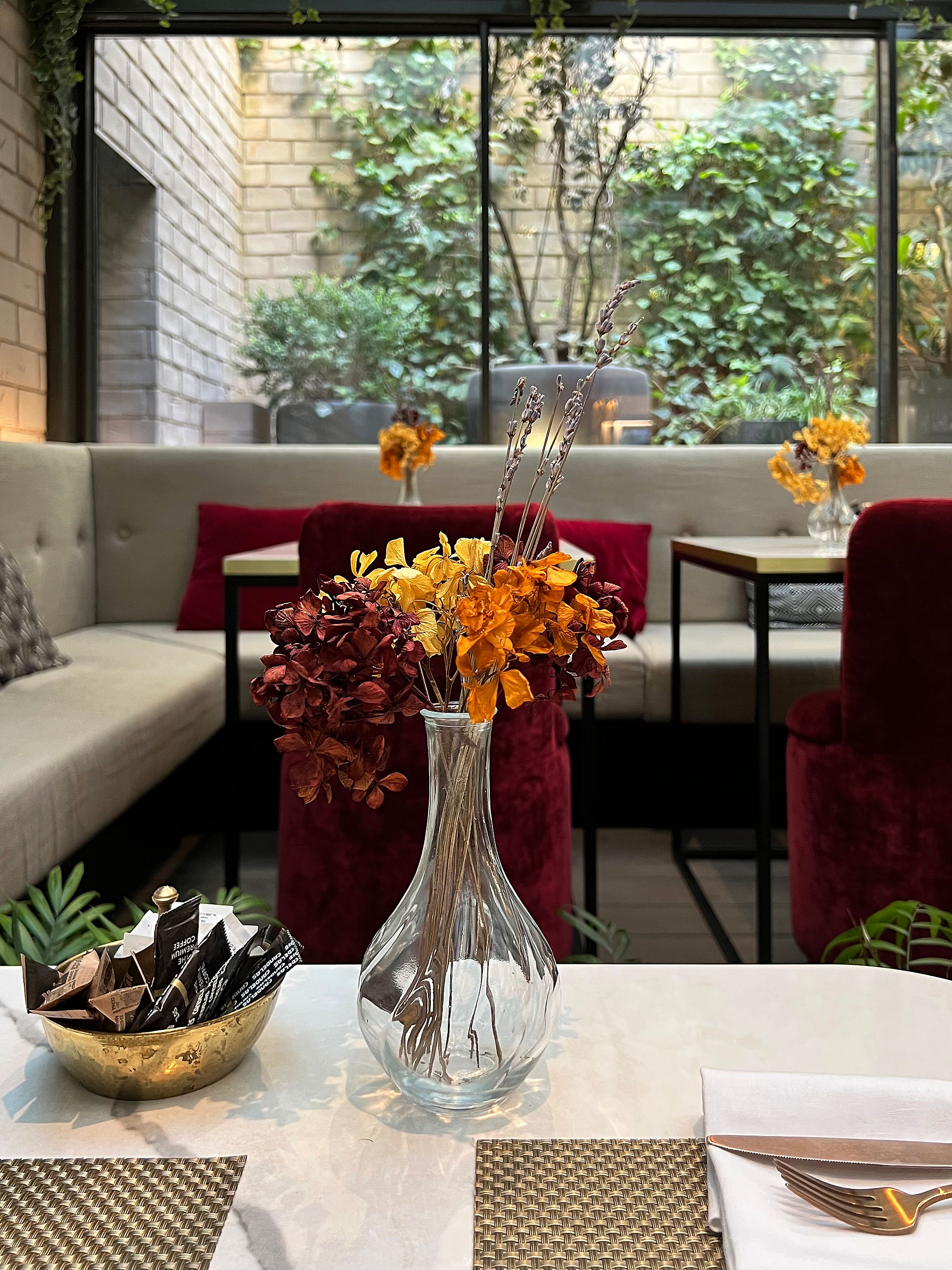Autumnal flower arrangement in a modern lounge