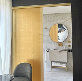 Golden door reveals luxurious bathroom