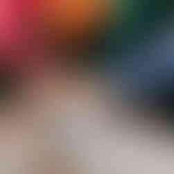 Hands stacked together, symbolizing unity and teamwork