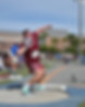 CJ Licata performing shot put throw during NCAA competition - New Jersey shot put coach