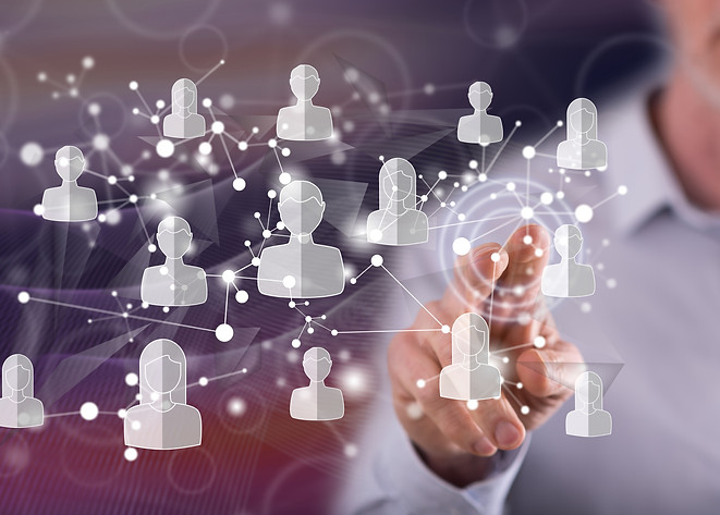 Man touching a social media network concept on a touch screen with his finger.jpg