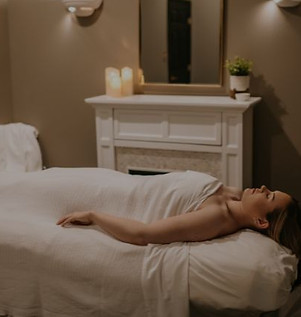 Woman getting a sports massage at Proactive Massage + Bodywork