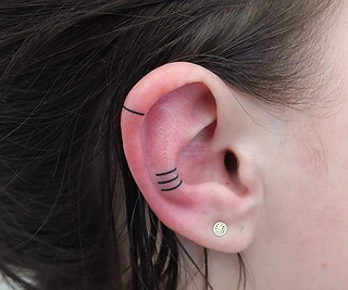 orelha-tatuada