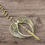 Thumbnail: Winged Sword Necklace