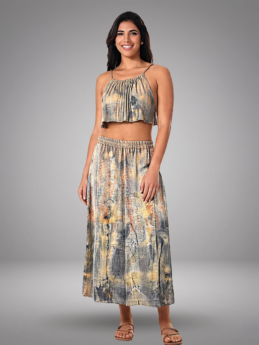 Handpainted upcycled viscose two-piece set featuring a cropped halter top and maxi skirt in earthy, hand-dyed tones.