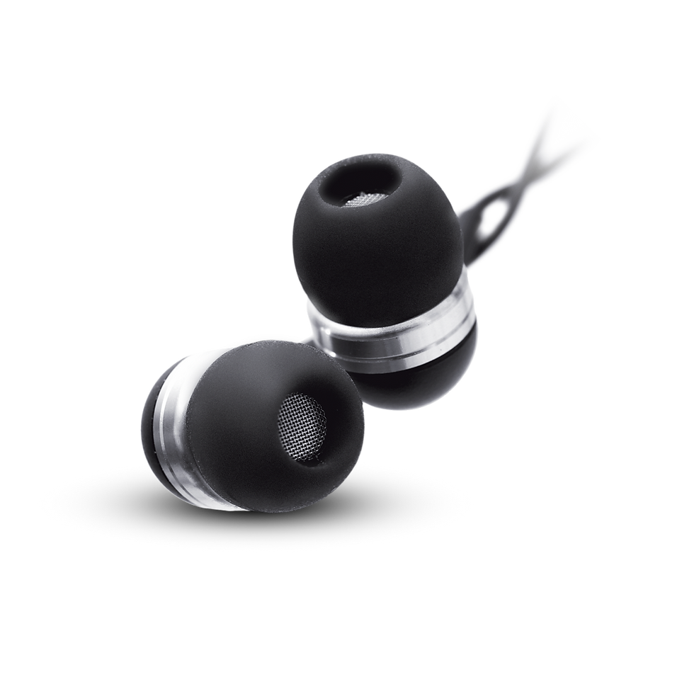 The image shows a close-up of a pair of black in-ear headphones. The earbuds are round, with a metallic silver band visible around the base. The headphones are positioned at a slight angle, lying on a dark surface against a white background. The focus is sharp on the earbuds, emphasizing their texture and detail.