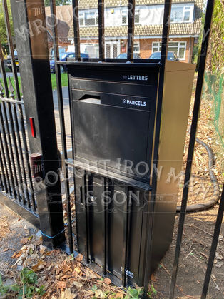 Parcel box integrated into railing.