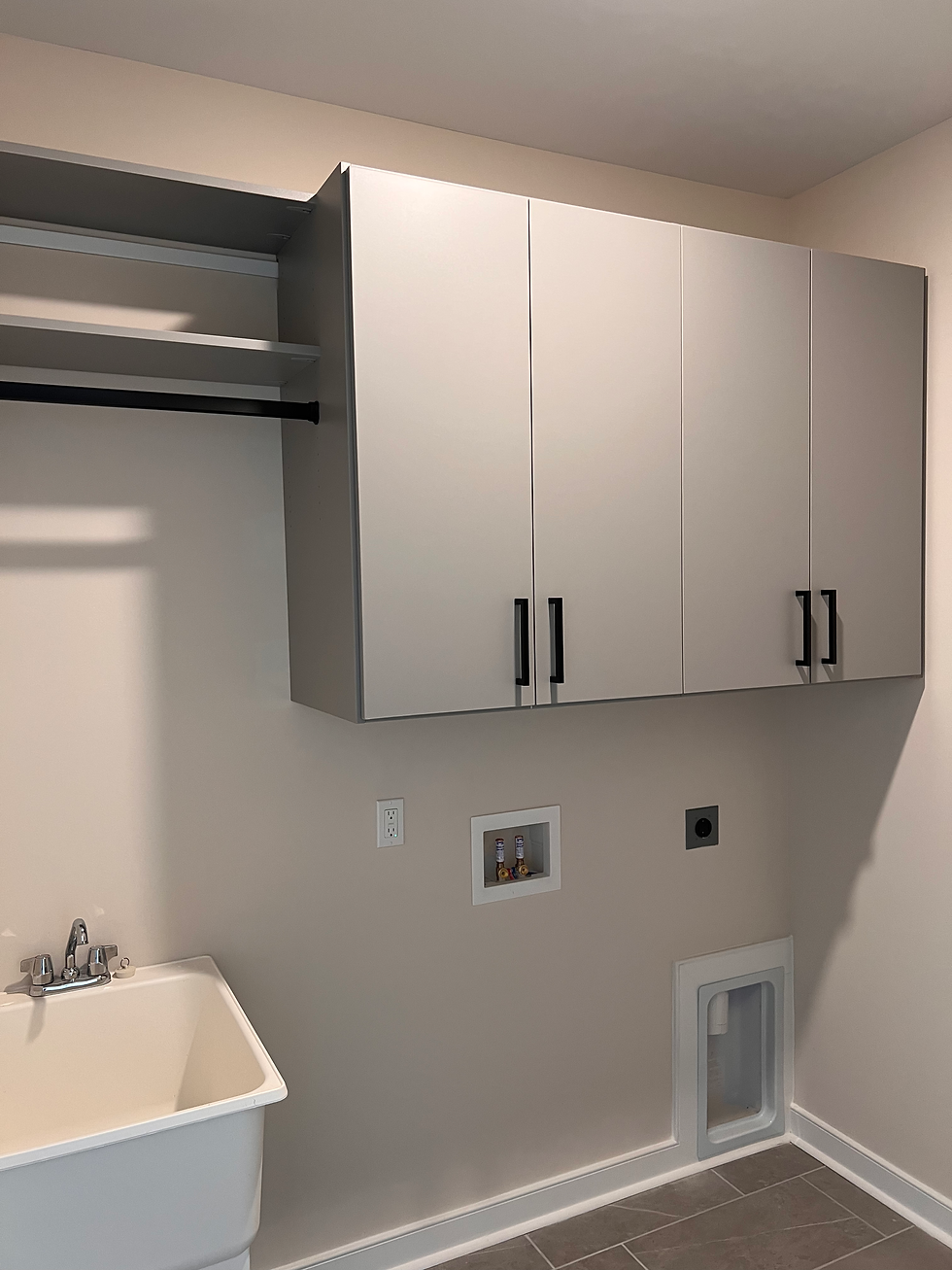 Reach-In Closet With Built-In Shelving, Shoe Storage, And Folded Clothing