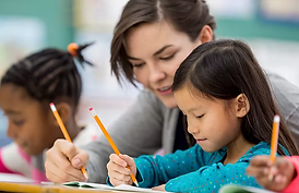 Woman Tutoring Child