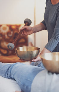 Woman preaparding tools for sound vibration