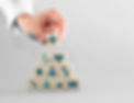 Stack of blocks with health care symbols on them