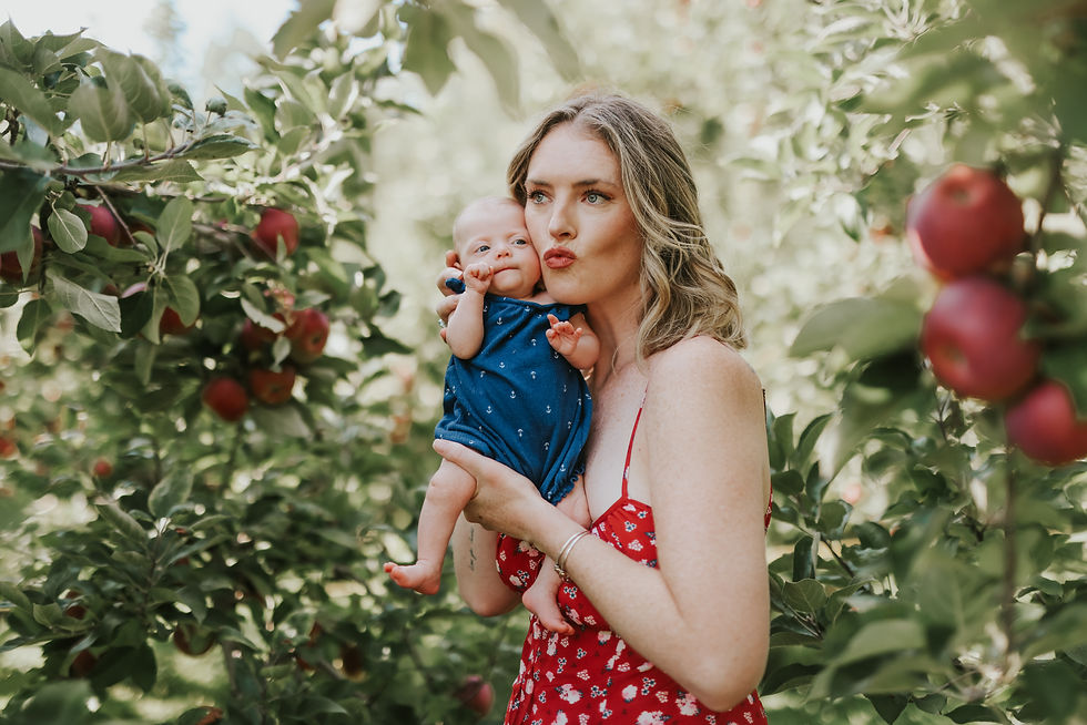 portrait of young woman holding a camera