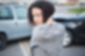 woman holding neck