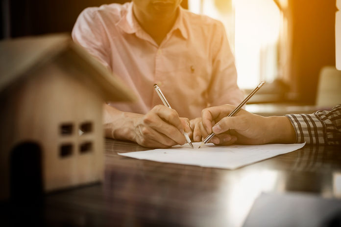Man drafting out a remodel plan
