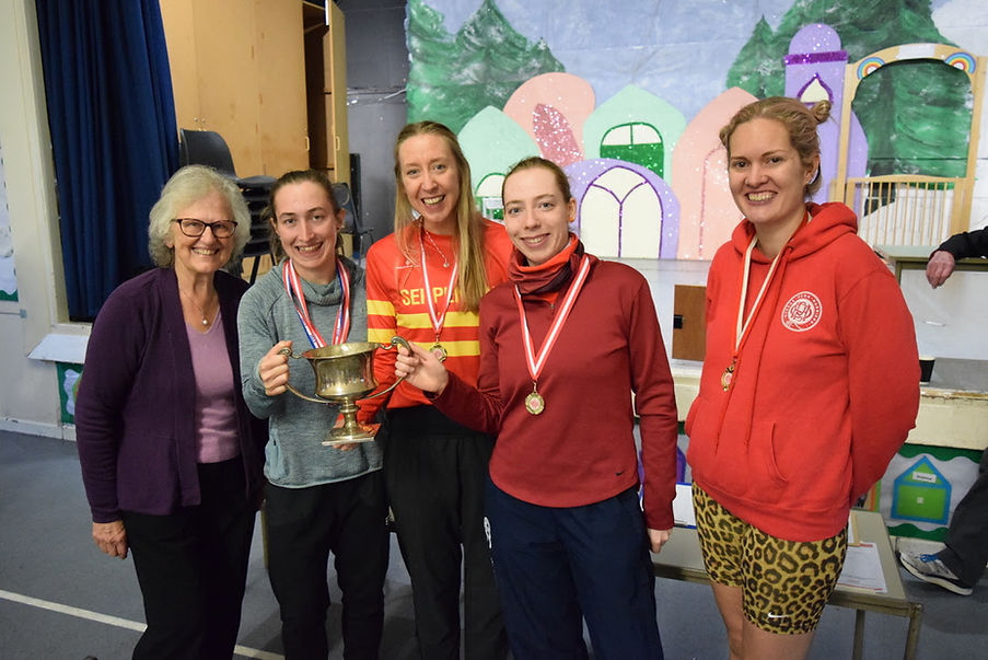 Tricia O'Connor (left), Emma Sutherland (President 2023, right), with the winning Serpentine runners (middle) holding the inaugural Tricia O'Connor cup in 2023